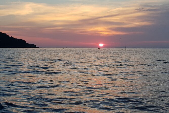 2-Hour Sorrento Coast Sunset Cruise with Dinner Experience - Entering the Sorrento coast at golden hour