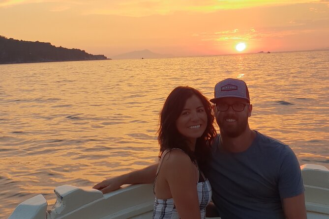 2-Hour Sorrento Coast Sunset Cruise with Dinner Experience - Captain Sal, live narration in English, and the limoncello moment