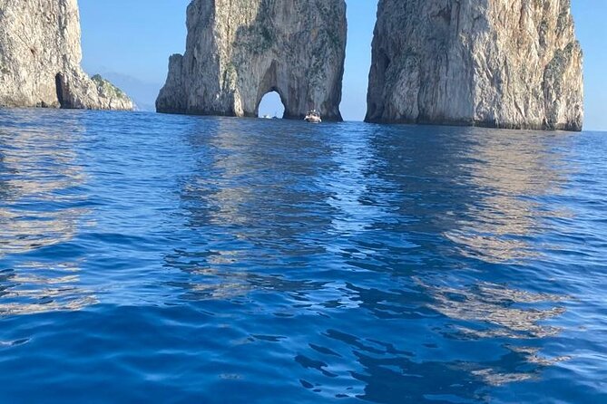 3 Hours Private Boat Tour of Capri with Pasta and Prosecco - Stop 5: Marina Piccola, yachts, villas, and lunch with a view