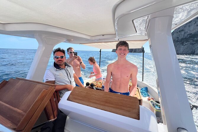 All inclusive Capri Boat and City Tour from Sorrento - The Aperitif Stop at Punta Ventroso: Food, Music, and Dips