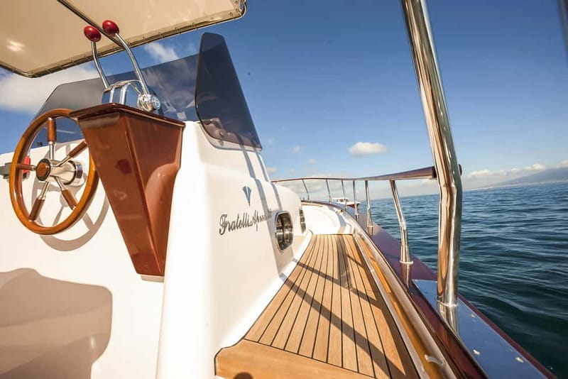 Amalfi Coast: Boat and Snorkeling Tour with Fruit & Drinks - Praiano’s Africana Grotto and the blue-water refraction effect
