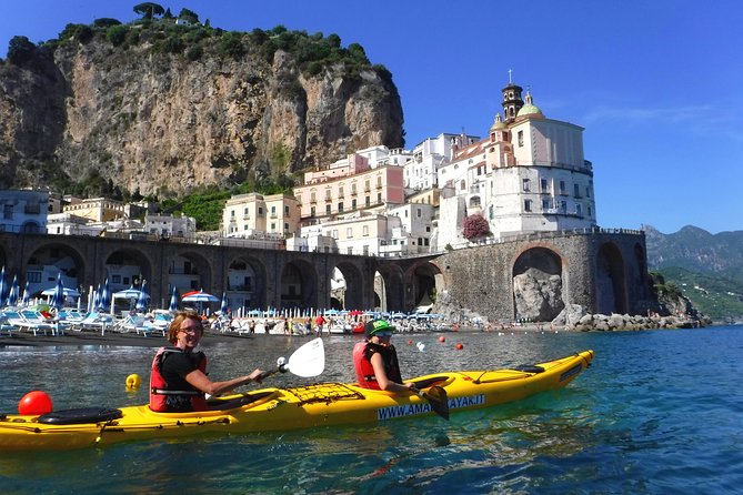 Amalfi Coast Kayak Tour: Explore Caves, Arches & Hidden Beaches - Conca dei Marini: fishermen village views and famous names from the coast