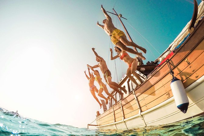 Amalfi Coast & Positano: Boat Tour with Snorkeling & Drinks - Furore Fjord stop: Italy’s only natural fjord and the 28-meter plunge venue