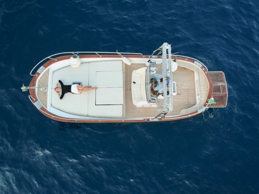 Amalfi Coast: Private Boat Trip with Prosecco and Snorkeling - Praiano cruising and grotto highlights that fit the camera