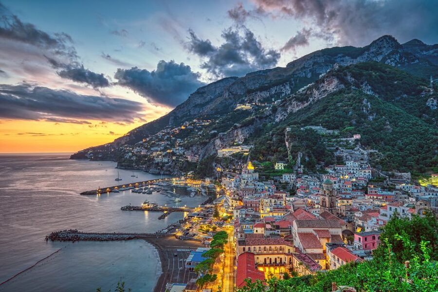 Amalfi Coast: Romantic Sunset Cruise with Music & Cocktails - Music and onboard atmosphere with a live guide