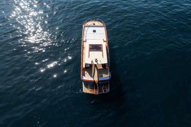 Amalfi Coast Semi Private Boat Day Trip from Sorrento - Positano free time: cobblestones, shops, and sea views