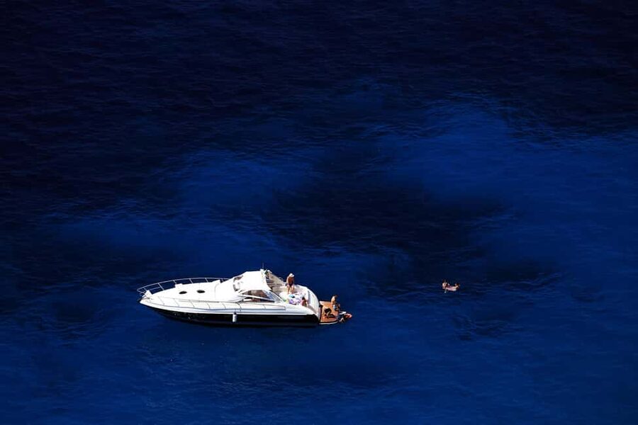 Amalfi: Private Full-Day Boat Excursion on the Amalfi Coast - The Sirenuses pass-by, then caves, grottos, and the swim break