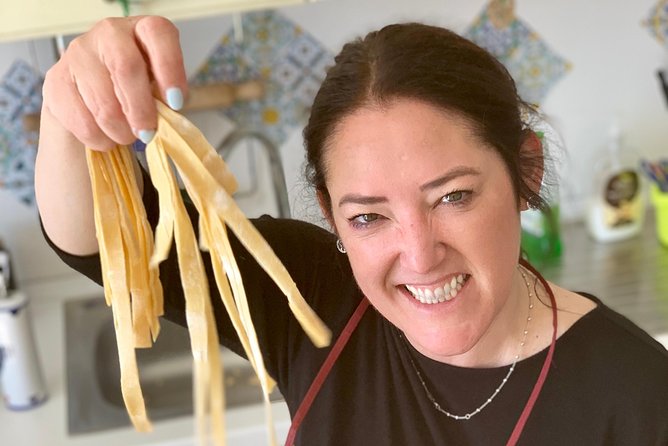 Authentic Cooking with Locals: Meal, Wine & Scenic Views - Into Rocco and Carla’s home kitchen: the wine comes first