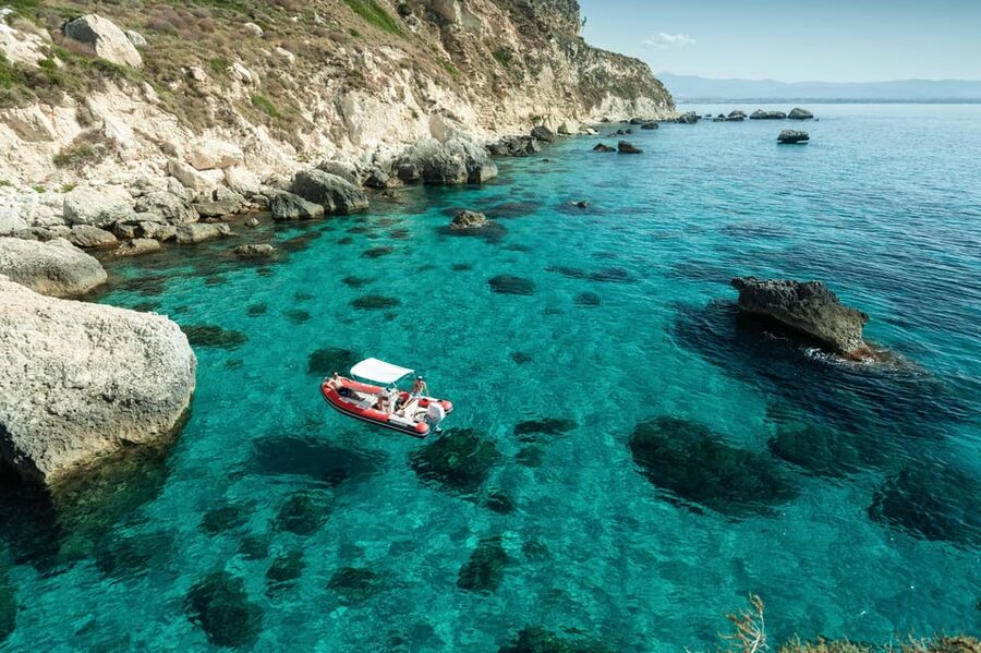Boat Rental Cagliari - Stop 1: Calamosca Beach for a classic Cagliari seaside pause