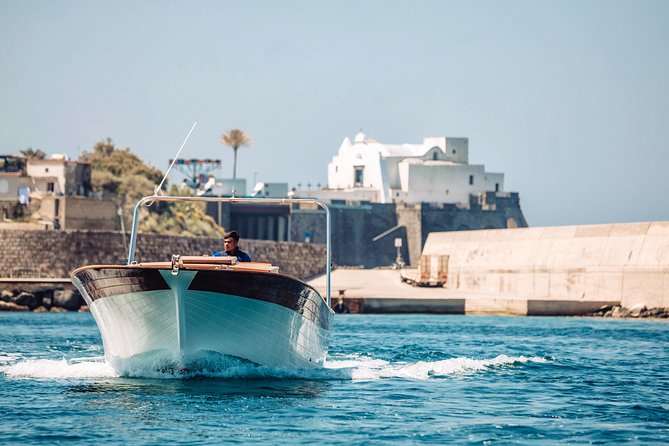 Boat tour of the island of Ischia with a typical Ischia 10-metre launch full day - Lacco Ameno’s mushroom rock: the town symbol you can’t miss