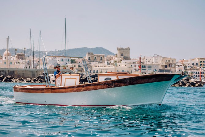 Boat tour of the island of Ischia with a typical Ischia 10-metre launch full day - Negombo beach and the thermal park coastline