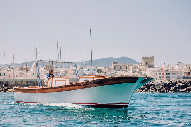 Boat tour of the island of Ischia with a typical Ischia 10-metre launch full day - On-board life: food, drinks, music, and crew personalities