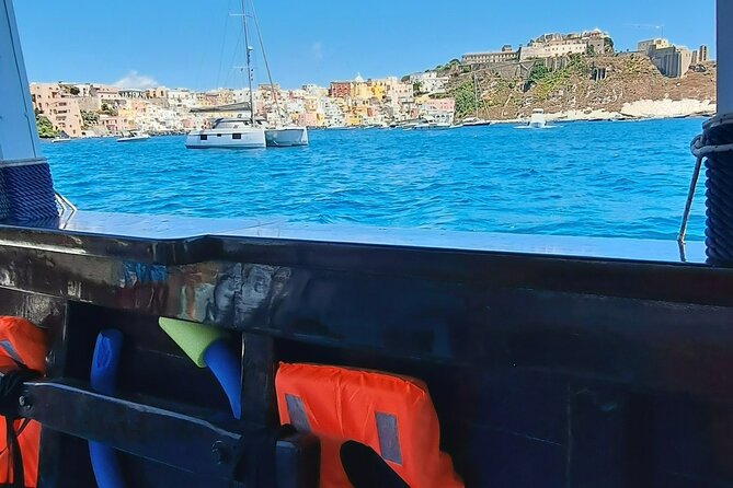 Boat tour with lunch on board to discover Procida - Arriving in Procida: colorful houses, fishing-village streets, and film-ready views
