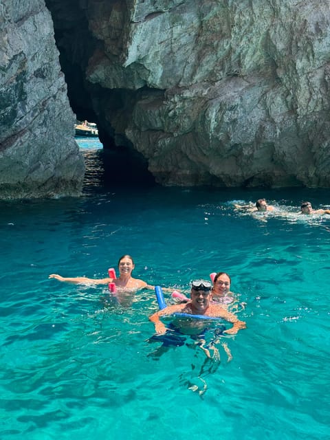 Capri: 2-hour boat tour of the caves and stacks - The faraglioni stacks arch, and why it is the photo you came for