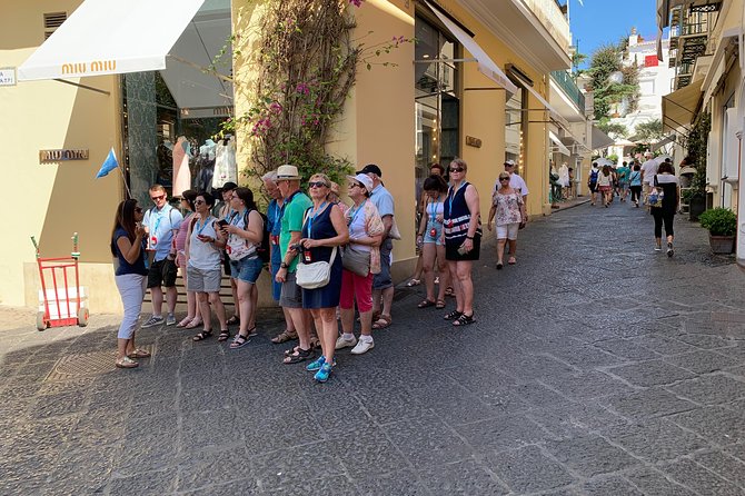 Capri & Anacapri Day Tour with Blue Grotto included from Sorrento - Capri town highlights: Faraglioni photos, Via Camerelle, and La Piazzetta rhythm