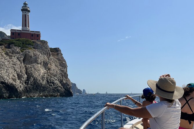Capri and Blue Grotto Private Boat Tour - Spiaggia Marina Grande and Bagni di Tiberio: the Capri warm-up