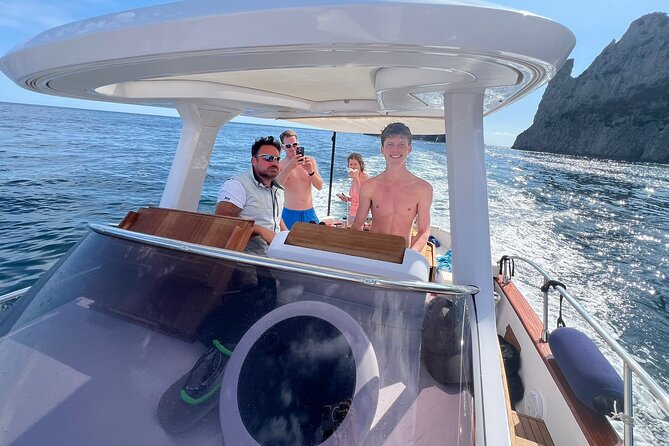 Capri and Blue Grotto Small Group Boat Tour - Roman-Style Coastal Stops Near Spiaggia Grande and Bagni di Tiberio