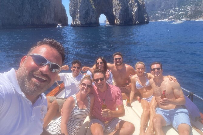 Capri and Blue Grotto Small Group Boat Tour - Cala del Rio, Heart Cave, and Punta Carena Lighthouse Views