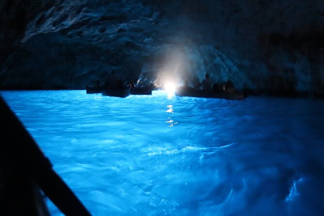Capri & Blue Grotto: Full-Day Tour with Guided Island Exploration - Capri town time: tiny streets, famous brands, and Via Camarelle browsing