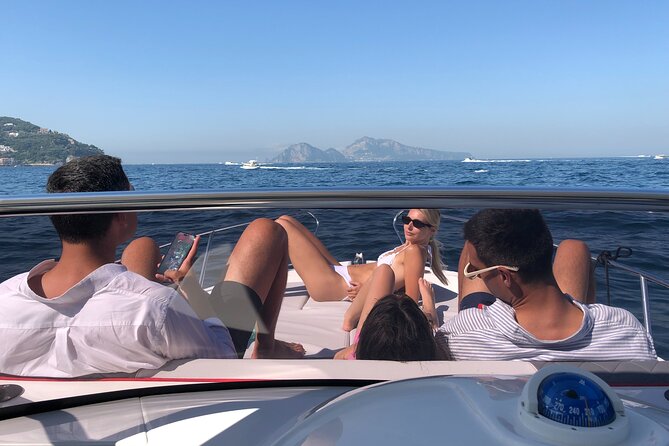 Capri Boat Tour from Sorrento - Capri first stop at the main port: lunch-by-the-water and easy transport