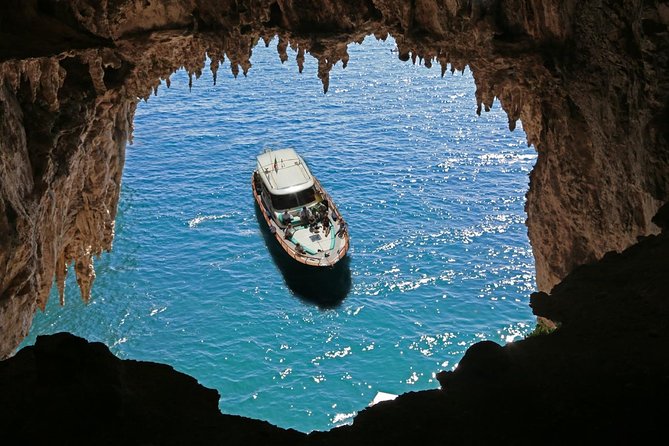 Capri Boat Tour from Sorrento: Swim, Grottos & Light Lunch - Coastal cruising to Capri, plus a Roman villa swim-cove stop