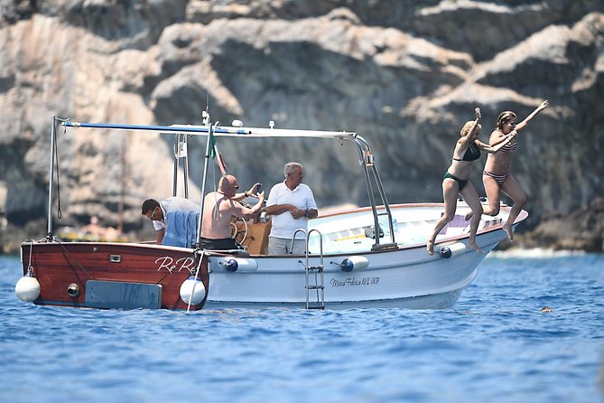 Capri Boat Tour: Grottoes, Swim & Sip Limoncello in a Small Group - Commentary and Communication: Great Sights, Mixed Explanations