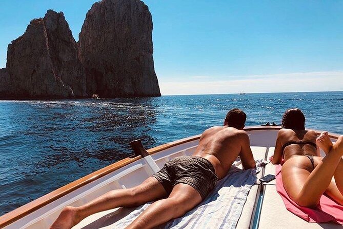 Capri Boat tour in 3 hours - Faraglioni: the sea stack show, best viewed from the arch
