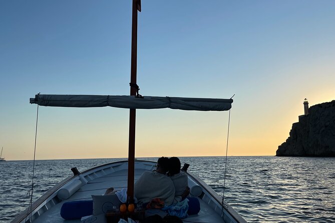 Capri Boat tour in 3 hours - The lighthouse on the west side: dramatic coast energy