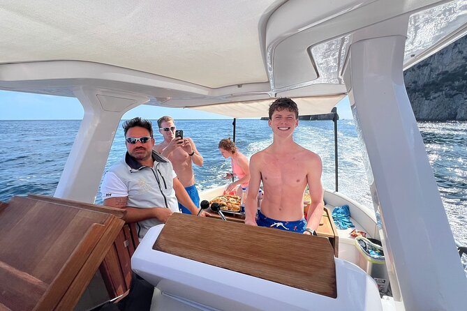 Capri Boat Tour Shared with Local Captain - Bays and bayside villas: Cala del Rio, Tombosiello, and designer history