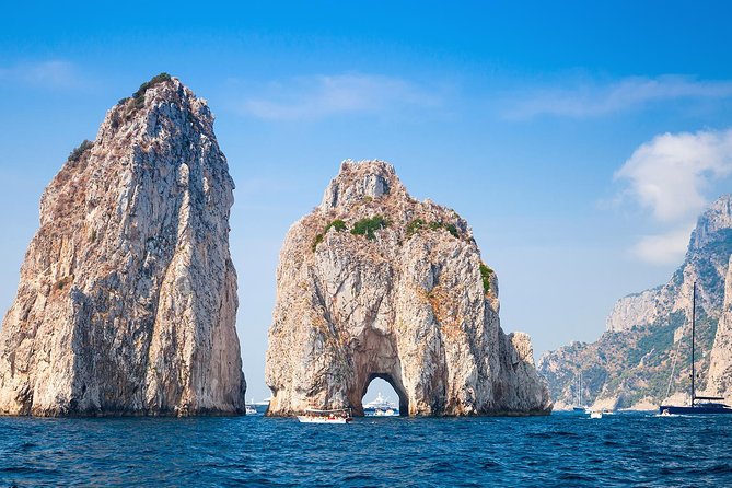 Capri by Sea Private Boat Excursion - Faraglioni Rocks: the hole-through-the-rock moment