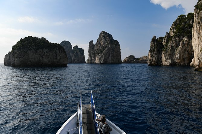 Capri Coast to Coast: Boat Tour with Optional Blue Grotto - Passing the grottos: Marvellous, White, and Green on the way