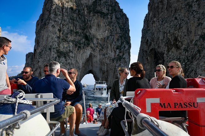 Capri Coast to Coast: Boat Tour with Optional Blue Grotto - The classic Capri loop from the water: Faraglioni to Punta Carena