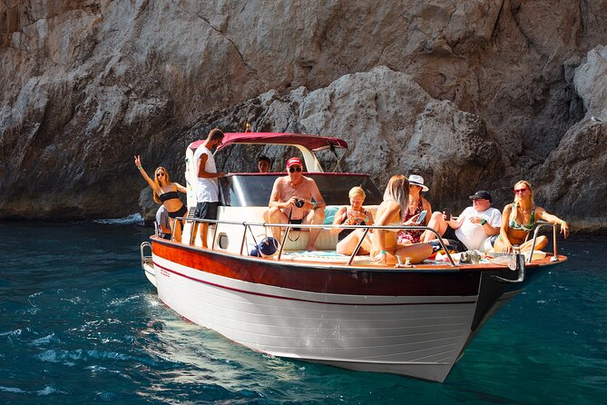 Capri Guided Boat Experience with Island Exploration and Transfer - Grotto Stops and Swimming Breaks: Weather Is Part of the Deal