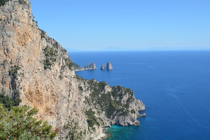 Capri Island and Blue Grotto Small Group Day Tour from Capri Port - Capri town and La Piazzetta: espresso, shops, and the crowd reality