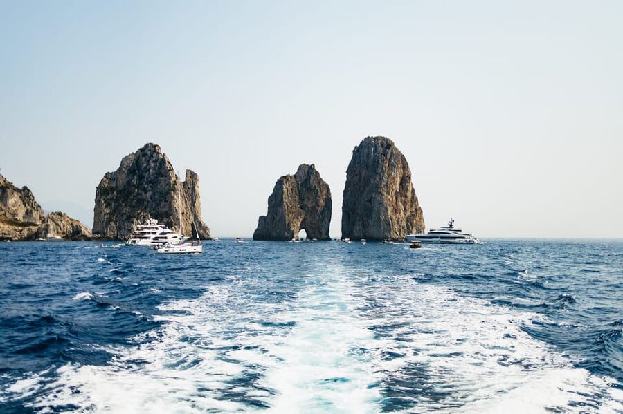 Capri: Island Boat Tour and Optional Blue Grotto Visit - Service Style: English Guide, Multiple Languages, and How Clear It Usually Is