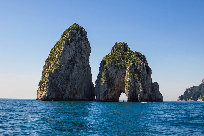 Capri & Nerano Bay Private Boat Tour from Sorrento,Positano,Capri - Capri from the water: Blue Grotto option, Faraglioni views, and Marina Piccola