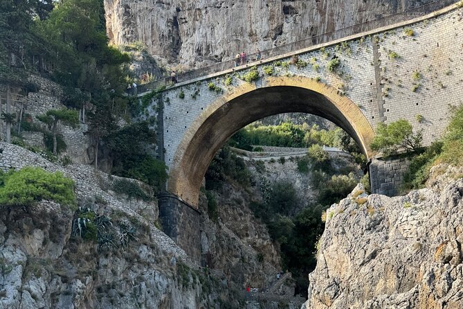 Capri Positano and Amalfi Ischia Private Boat Tour from Sorrento - Fiordo di Furore and Punta Campanella, two coast landmarks that anchor the photos