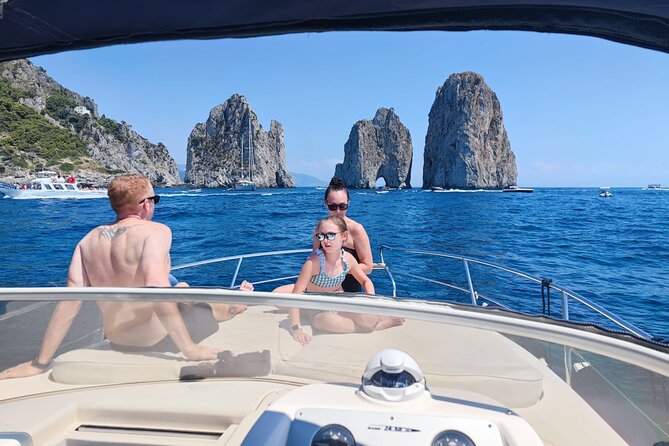 Capri Private all inclusive Boat Tour with City Exploration - The boat experience, drinks, snacks, and the adult age rule