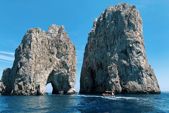 Capri Private Boat Excursion with Faraglioni and Blue Grotto - The quick-hit cave and arch sequence in Capri