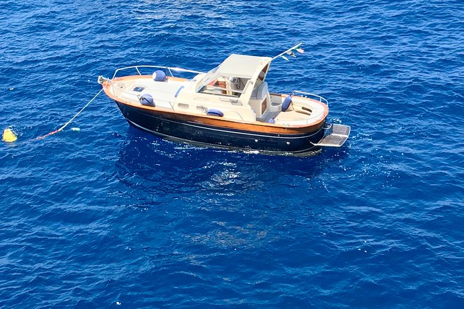 Capri Private Boat Experience - Caves, coves, and the Natural Arch stop