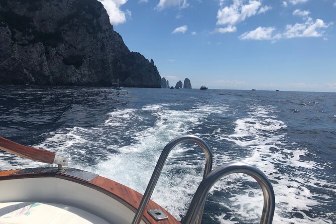 Capri Private Boat Tour from Capri (3 Hours) with Blue Grotto - Blue Grotto entry: skip-the-line tickets plus the cave-under-your-boat moment