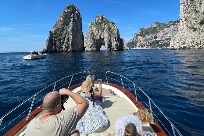 Capri Private Boat Tour from Positano or Praiano - I Faraglioni and the Arch of Love: your first real Capri moment