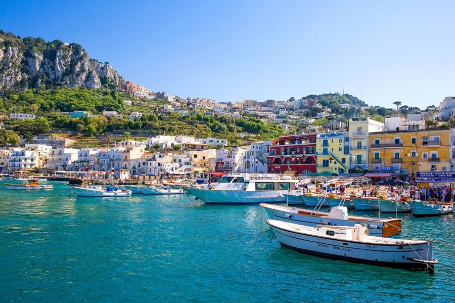 Capri Private Full-Day Boat Tour from Sorrento - Punta Carena Lighthouse: dramatic coastline and a peek at the luxury circuit