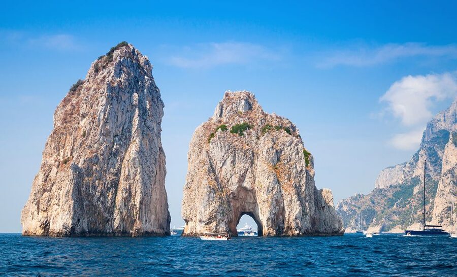 Capri Private Full-Day Boat Tour from Sorrento - Hidden swimming moments and the multi-docking finale