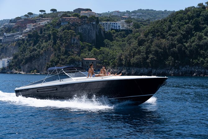 Capri Private Yacht Tour from Sorrento, Capri & Positano - Faraglioni rocks, Marina Piccola views, and the “Arc of Love” angle
