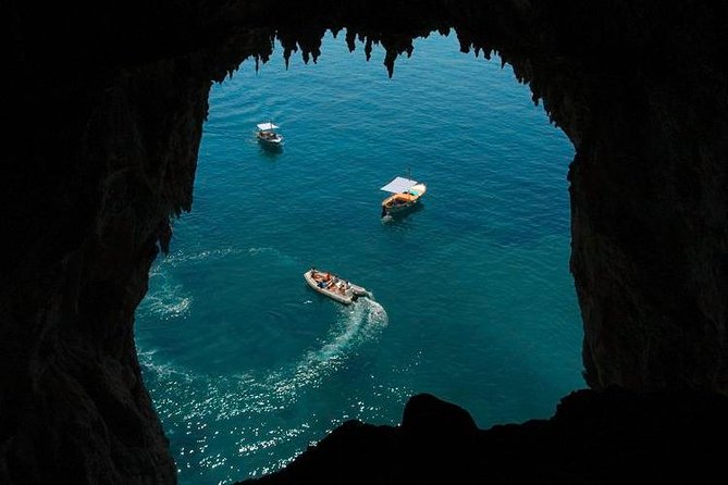 Discovery Capri Island by Boat from Capri - White Grotto: looking up for the Virgin Mary stalagmite
