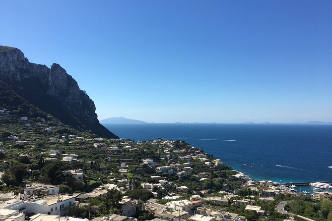 Exclusive Private VIP Capri Boat Experience on a Gozzo - Stop 2: Capri by boat, with swim breaks and cliff views