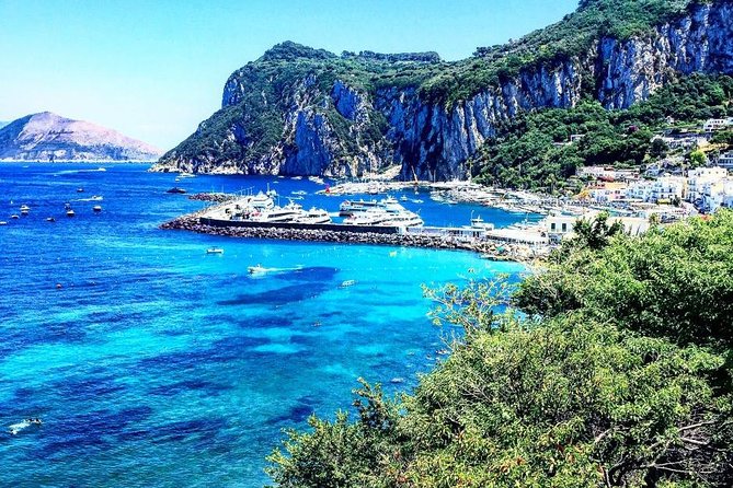 From Capri Semi-Guided tour of island at Pier 23 at 10,20 - Capri town walk, then optional Gardens of Augustus for the best sea angles