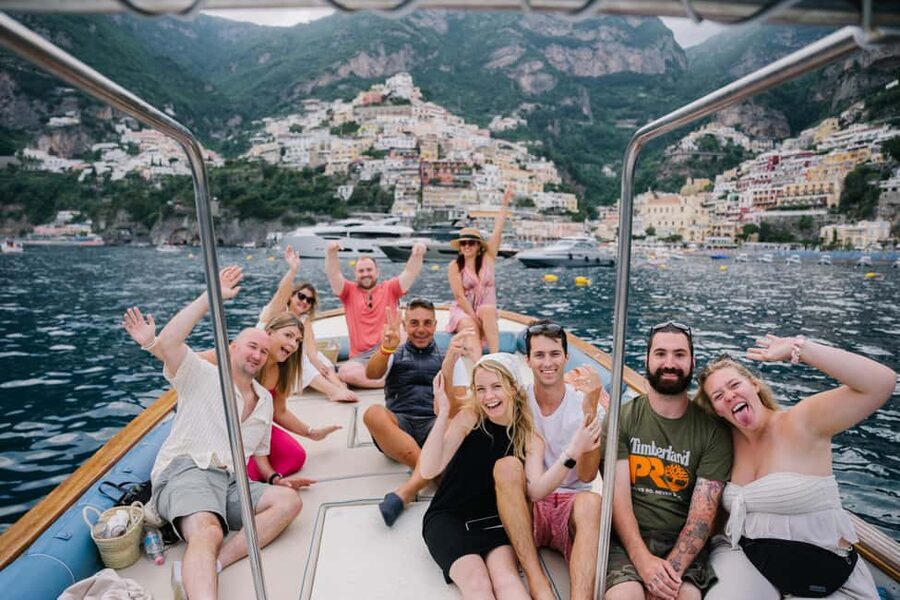 From Positano: Amalfi Coast Sunset Cruise - Group Tour - Marina di Praia: boats and houses in a calmer setting