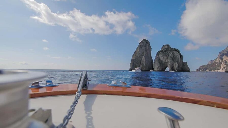 From Positano: Day trip to Capri - Group Tour by boat - Capri From the Water: Marina Piccola, Big Landmarks, and the Drop-Off Style